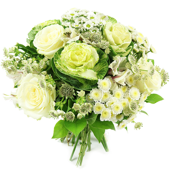 A beautifully balanced bouquet of white and green flowers is pictured against a clean white backdrop, the neutral setting highlighting its cool, elegant palette. At the centre, creamy white roses open fully, their petals arranged in smooth, overlapping layers that create a soft, rounded profile, almost glowing with a hint of warm cream at their hearts. Surrounding them are decorative ornamental cabbages, their robust leaves forming compact rosettes: dark, saturated green at the outer edges, graduating to paler, yellow-tinged green at the frilled centres. These unusual blooms bring a contemporary, garden-to-vase charm. Interspersed throughout are petite white spray chrysanthemums and small daisy-like flowers, each sporting a neat yellow or yellow-green centre, adding cheerful flecks of brightness and fine texture. Slender stems of greenish-white astrantia, with their intricate star-shaped flower heads, rise gently among the larger blooms, giving the bouquet an airy, slightly meadow-like feel. Hints of smooth white petals, reminiscent of alstroemeria, weave in and out, increasing depth without disturbing the calm, monochrome mood. A generous halo of fresh foliage in various shades and shapes of green frames the design, shaping it into a lush, rounded hand-tied bouquet. At the bottom, the stems are visibly gathered and neatly bound, ready to be placed into water after a delivery from Feltham Flowers. This arrangement feels both pure and modern, equally at home as a wedding piece, a condolence bouquet, or a stylish accent for minimalist interiors across Feltham, Bedfont and the surrounding west London suburbs.