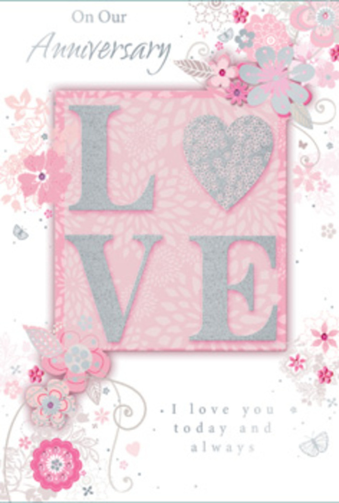 This anniversary card evokes the feeling of stepping into a bright, peaceful room where love is honoured in everyday gestures, much like returning home to a bouquet from Feltham Flowers arranged on the kitchen table. The central design features the word LOVE, its letters elongated and elegant, with a soft, frosted glitter overlay that gives a subtle, crystalline shimmer. The embossing of the letters adds depth, so they rise gently from the surface, inviting the touch in the same way textured petals and foliage do in a hand-tied bouquet. Around this central word, wispy, hand-drawn flowers float along the card's borders and corners, as if drifting on a light breeze. The colour palette is a gentle blend of pink, lilac, and ivory tones, each petal shaded carefully so the hues melt into one another in a harmonious gradient. Fine filigree lines trace the stems and leaves, curving in elegant tendrils, while tiny flourishes and discreet butterflies nestle among the blooms, suggesting a quiet flutter of emotion. The background is a soft, even pink that supports the imagery without shouting for attention, creating a sense of warmth and calm. Nestled near the lower part of the card, the phrase I love you today and always is set in a modest, graceful typeface. It does not dominate visually, yet its message feels central, echoing the enduring affection the card is meant to celebrate. The overall impression is of a paper bouquet-delicate, detailed, and thoughtfully composed-ideal to accompany anniversary flowers delivered around Feltham's neighbourhoods, from family homes near the high street to quieter residential lanes.