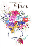 This Mother's Day card displays a joyful, watercolour bouquet that seems to hover weightlessly against a bright white background, the way a fresh arrangement might catch the eye in a Feltham living room. Central to the design are full, generous blossoms in vivid cerise and rich magenta, their rounded petals outlined and shaded with flowing strokes of indigo that lend them form and a gentle sense of movement. Clustering around them, softer blooms in shades of lavender, sky blue, and blush pink emerge as layered washes, with colours softly bleeding into one another, echoing the natural overlap of petals in a bouquet prepared by Feltham Flowers. Subtle touches of gold run along the curves of petals and the hints of foliage, giving a delicate shimmer reminiscent of morning sun glancing off fresh vases in local shopfronts. The negative space around the flowers is animated by small paint splashes and scattered heart shapes, adding a playful, celebratory feel, as if love itself were flickering around the bouquet. A modest rounded vase anchors the scene at the bottom, its outline merely suggested with pale blues and greys, and finished with a slender golden bow that calls to mind the quiet satisfaction of tying the final ribbon before a bouquet goes out for delivery across Feltham. The overall impression is one of warmth, gratitude, and lightness, combining artistic spontaneity with the practiced eye of a florist. As a Mother's Day greeting, this illustrated bouquet becomes a lasting symbol of appreciation, pairing beautifully with real flowers and carrying a sense of heartfelt connection into the home.